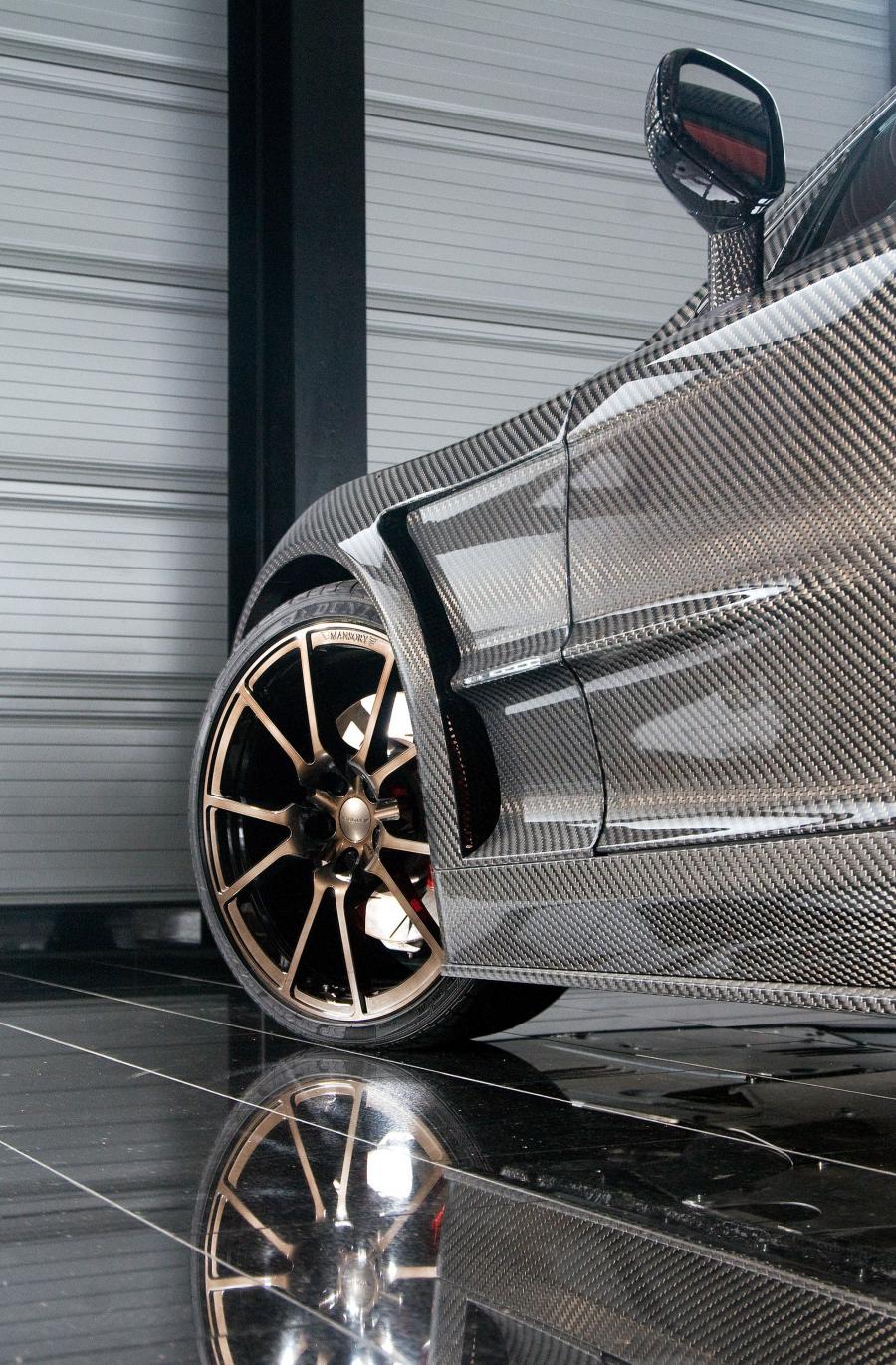 Детали экстерьера Aston Martin DB9 Cyrus by Mansory 2009 года  (фото 22 из 34)